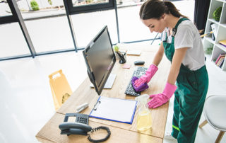high angle view of young woman in rubber gloves